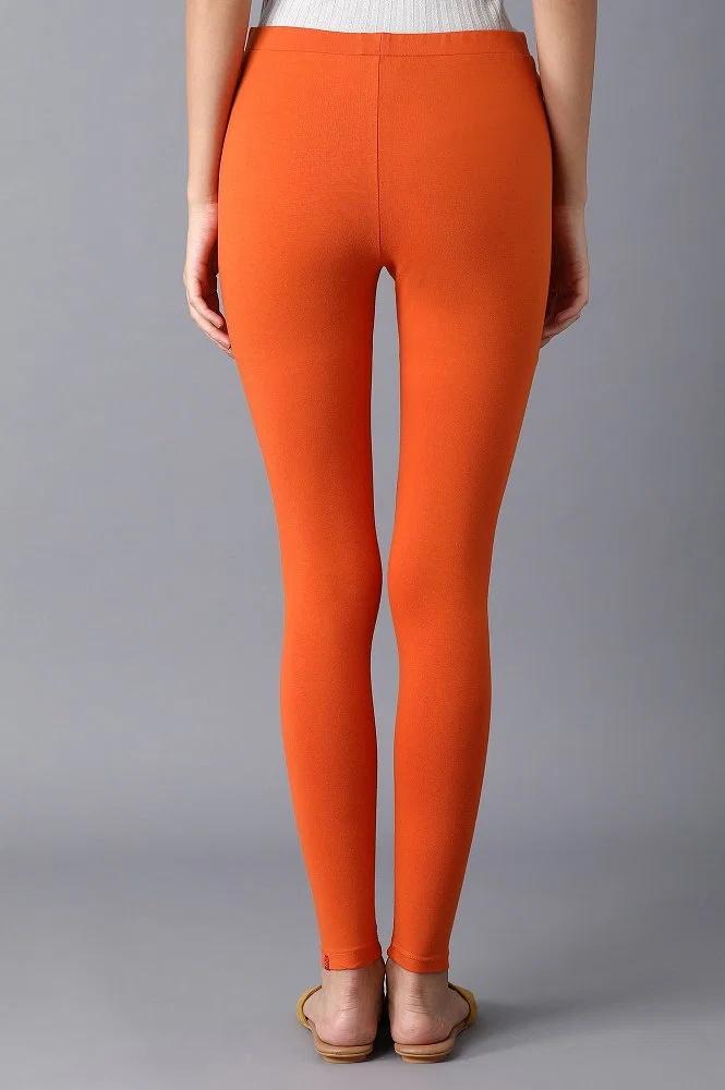 Burnt orange polka dot Leggings for Sale by FoxRoad