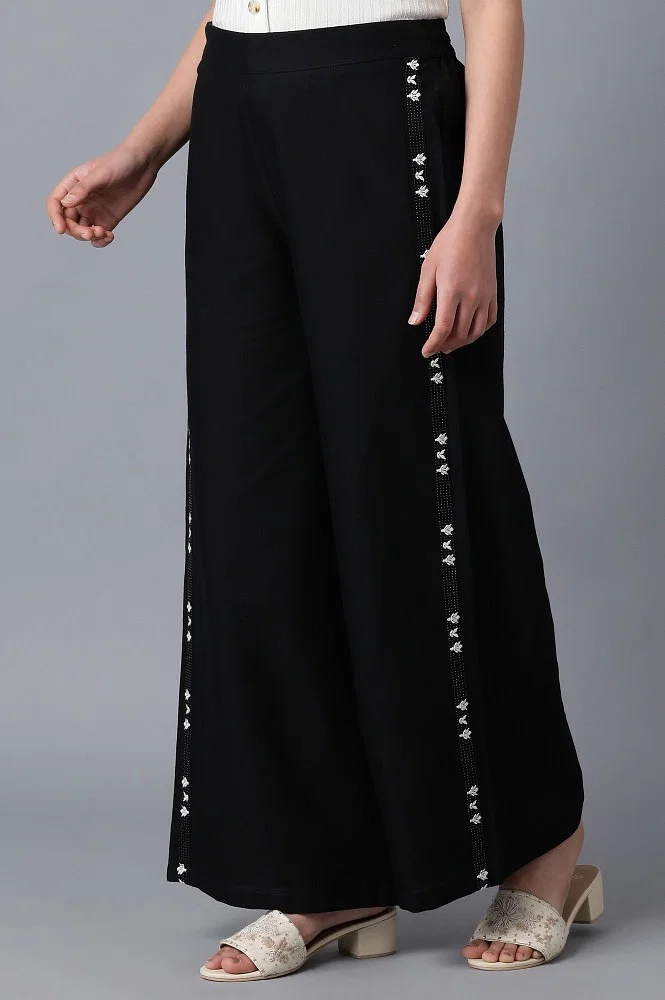 Buy Women Black Solid Regular Fit Parallel Trousers - Trousers for Women