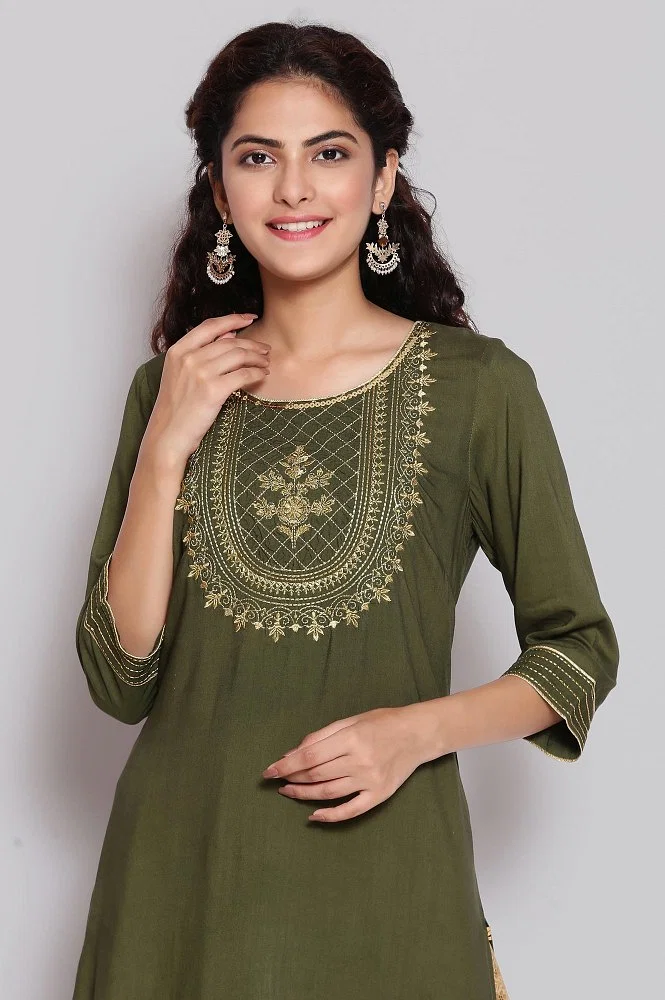 green embroidered ethnic dress