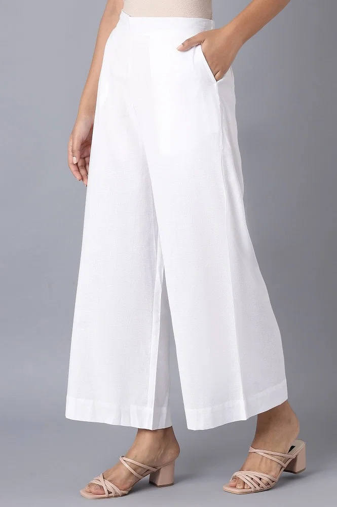 Buy online White Solid Relaxed Fit Straight Laced Hem Palazzo from bottom  wear for Women by Valles365 By S.c. for ₹700 at 65% off
