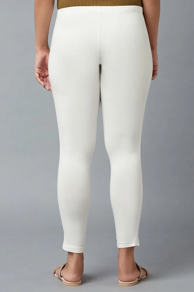 White Cassia Leggings by Beaufille on Sale