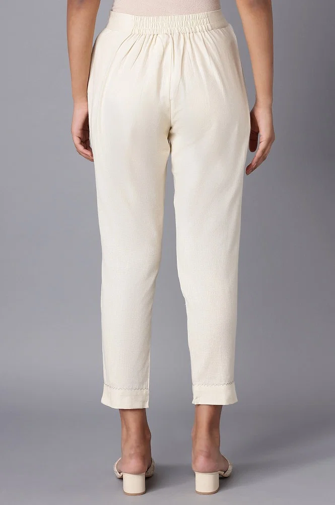 Buy Ecru Solid Slim Pants With Lace Online - W for Woman