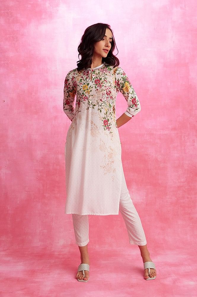 Buy Women's Pink White Floral Print Kurti online in India...