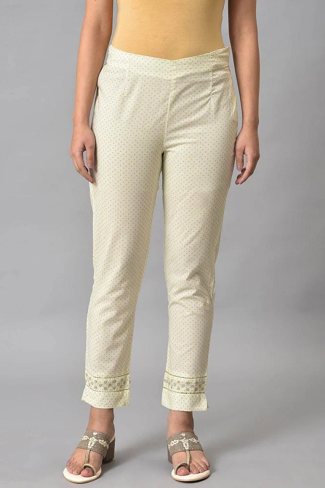 Ecru Solid Slim Pants With Lace