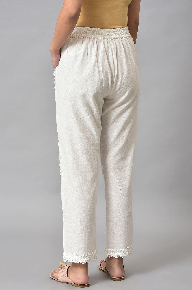 TOAST - Loose Silhouettes · Wide Leg Cotton Trousers Inspired by early 20th- century styles, our cotton trousers are cut with voluminous wide legs.  Defined by the drawstring waist and finished with deep