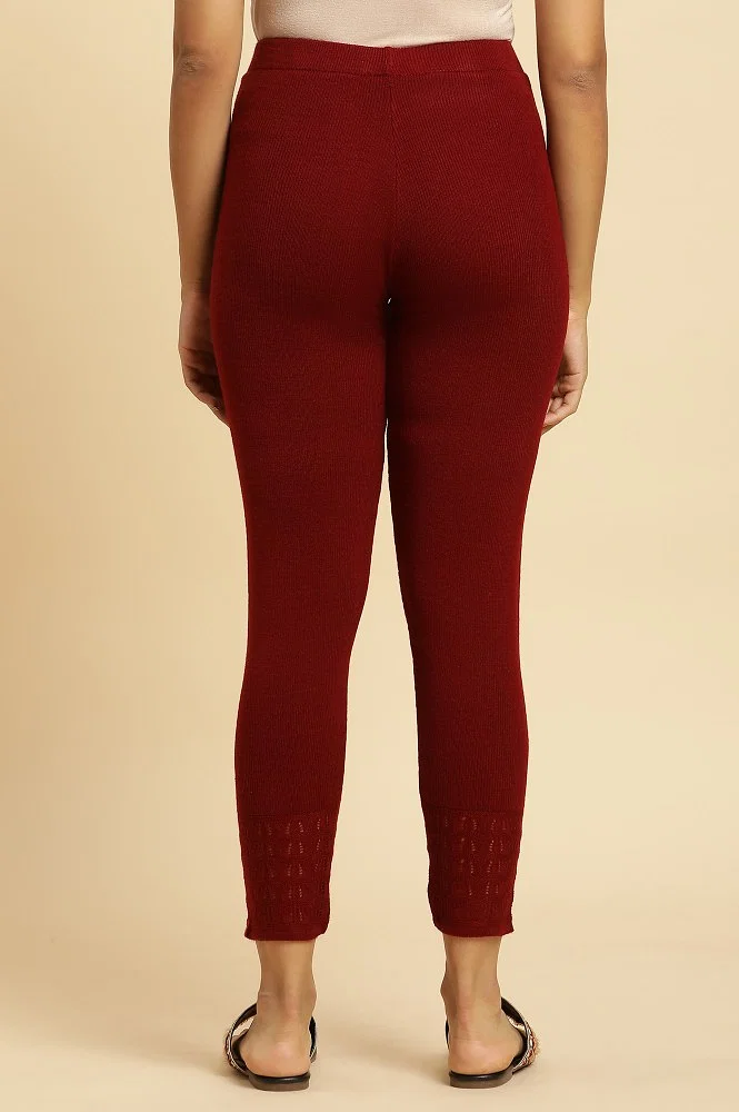 Winter leggings colored in Red and black, fantasy patterns and sky behind.  Fashion style. 148-1